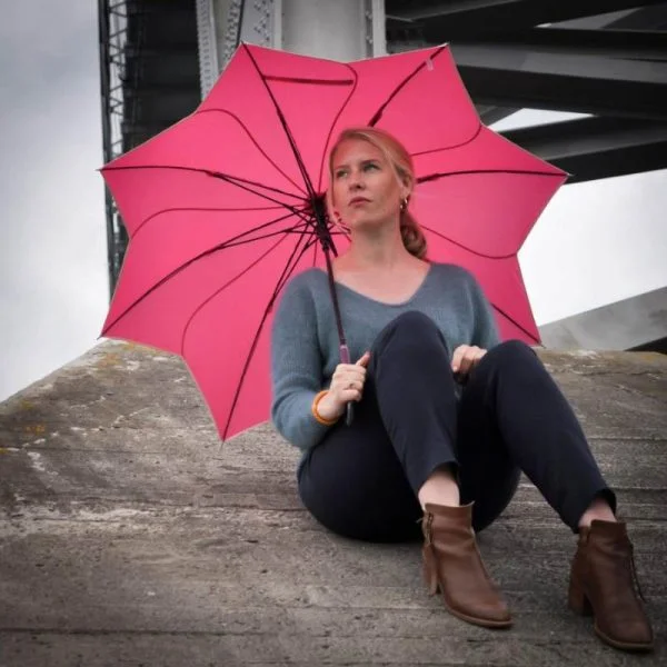 Pink Petal Swirl Umbrella Modelled